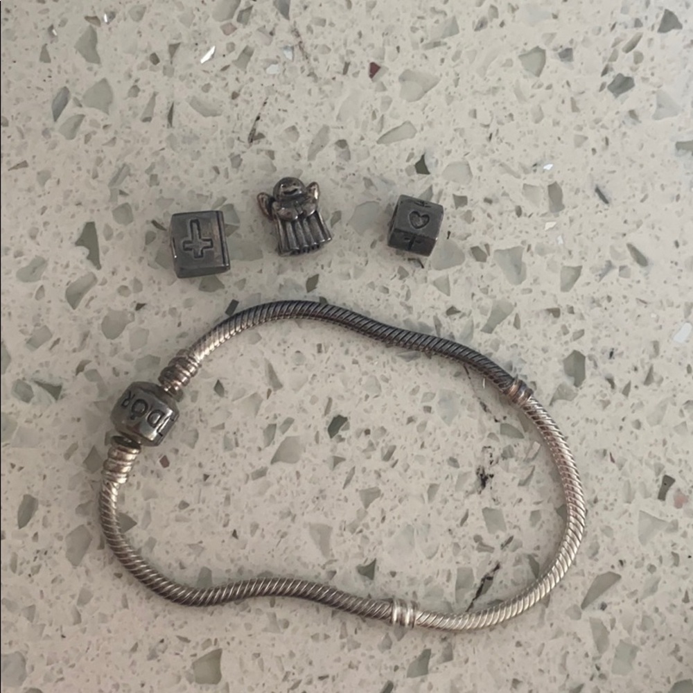 Pandora braclet angel bible and cross heart charms